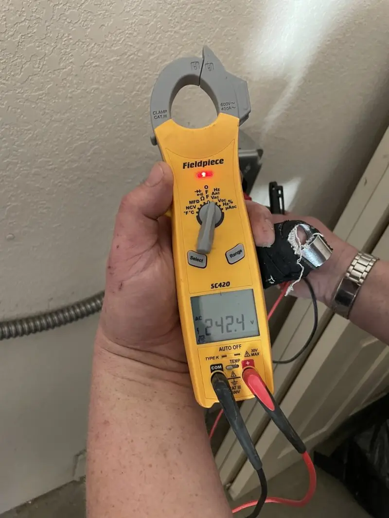 Voltage testing with clamp meter during Generator Installation in Thomasville